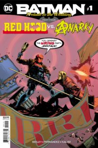 Red Hood fighting Anarky amid a protest