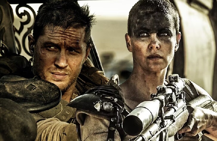 Mad Max and Furiosa look out of a vehicle, her with a gun aiming out in her hand.