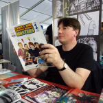 Treehouse Comic Dundee reading someone else's wares, Thought Bubble, 2915