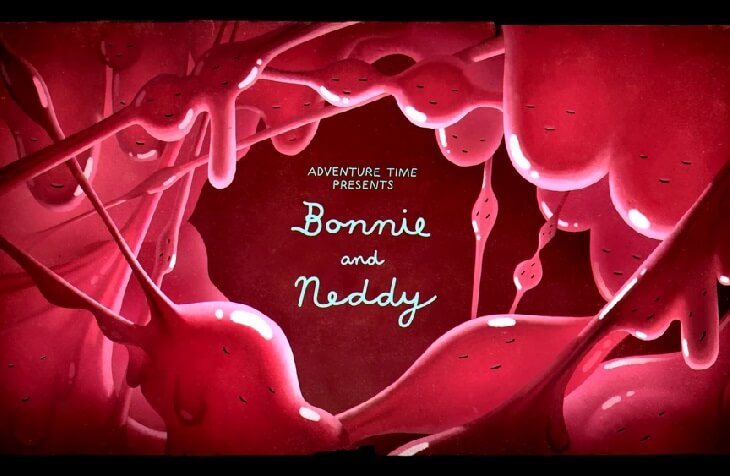 Title card from the Adventure Time episode, The Adventures of Bonnie and Neddy. The text is in the middle of a gooey, pink, gummy cave with contented faces everywhere.