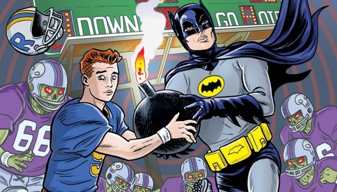 Archie and Batman hold a bomb in Archie Meets Batman '66 #5: The Batman of Riverdale Cover A. Written by Michael Moreci and Jeff Parker, drawn by Dan Parent. Archie Comics and DC Entertainment. December 5, 2018