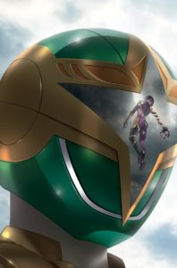 The Pink Ranger is reflected in the visor of the Green Ranger in Mighty Morphin Power Rangers #34 Cover C. Written by Marguerite Bennett and drawn by Simone Di Meo. Published by BOOM! Studios. December 26, 2018