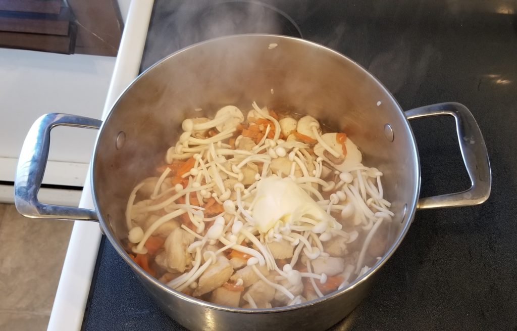 mushroom rice ingredients in a pot