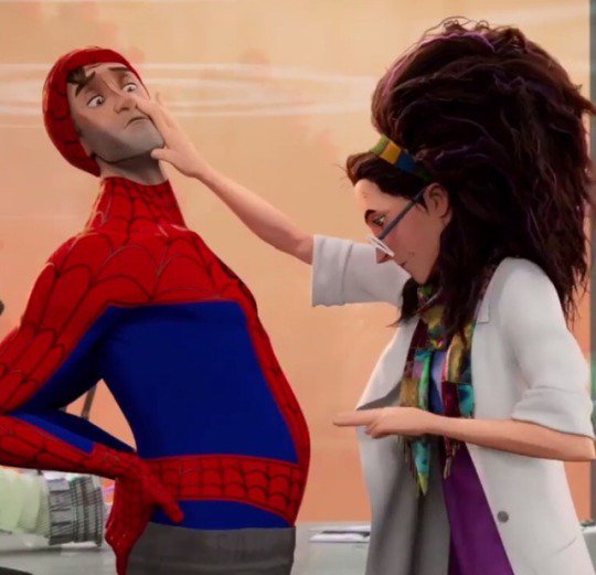 Image from Into the Spider-Verse of Liv examining Peter B. Parker. 