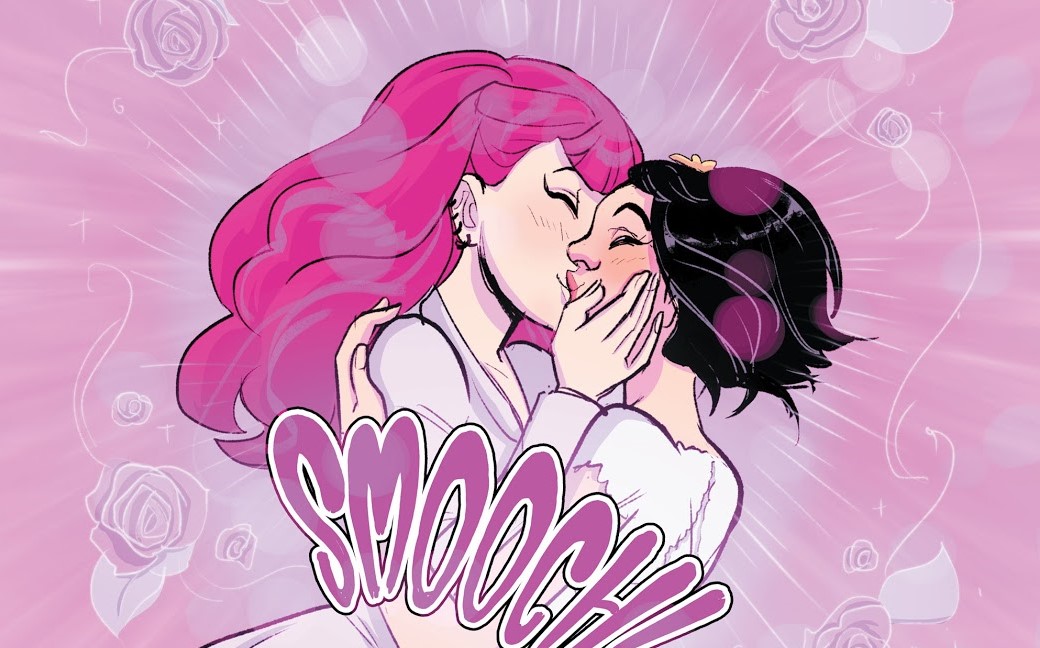 A couple kiss on their wedding day - "SMOOCH!"