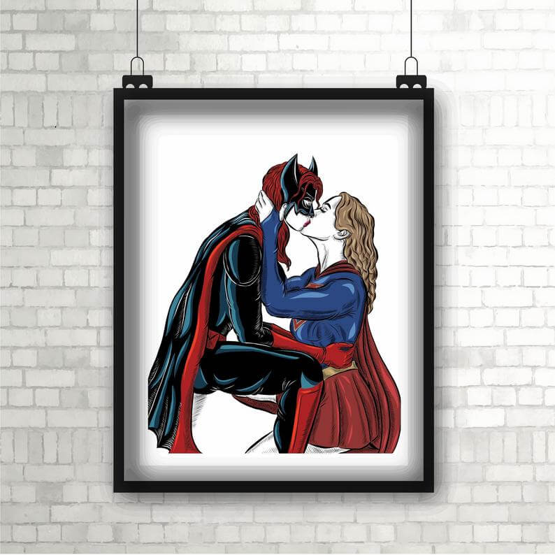 Supergirl and Batgirl kissing