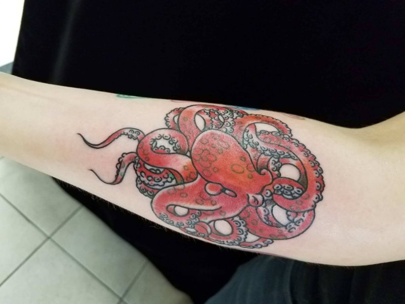 A red octopus on Alenka's arm