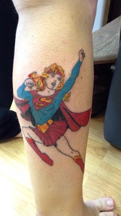 Supergirl flies on Corinne's leg