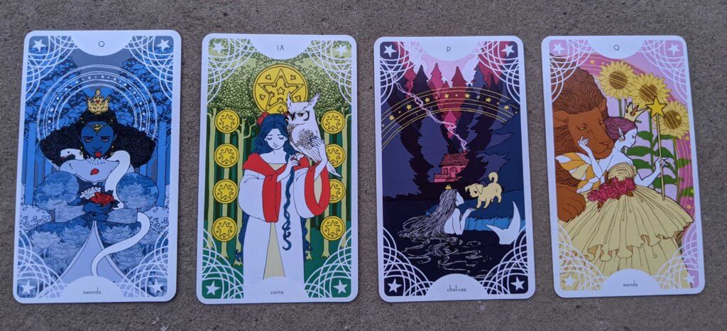 Four cards from Trungles' Star Spinner Tarot: the Queen of Swords, the 9 of Coins, the Page of Chalices, the Queen of Wands