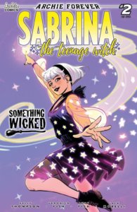 Sabrina Spellman - a white-haired white-skinned teenager, wears a white-star speckled black dress a she floats in the middle of the air, conjuring further glowing stars into being