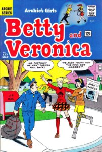 Betty Cooper, a teenager in a red sweatshirt and red and black plaid skirt and kneesocks and Veronica Lodge - a brunette with chin-length black hair held back by a yellow headband, an orange sweater, and a yellow miniskirt with green and yellow patterned tights - try to halt their mailman. They're both wearing merchandise declaring themselves fans of "jingo", and Veronica holds a newspaper declaring his recent marriage. Both girls are perturbed by this event.