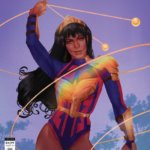 Yara Flore with her armor reflecting light like a prsim - Wonder Girl #2 Pride Variant