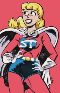 Betty Cooper - a blonde white teenager - poses with her hands on her hips. She is dressed in pink tights and a white cape as her superheroine alter ego, Superteen. She stands before a plain pink backdrop