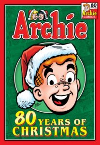 Archie Andrews - a redheaded white teenager - grins at the audience while wearing a red and white santa hat. His head is all one sees and it rests in a pale green circle against a dark green background