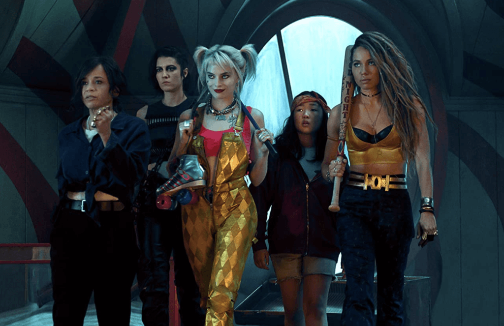 Renee Montoya, Huntress, Harley Quinn, Cassandra Cain, and Black Canary walk together in Birds of Prey.