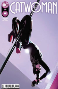 Catwoman hanging from a pole 