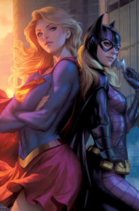 Supergirl and Batgirl standing back to back
