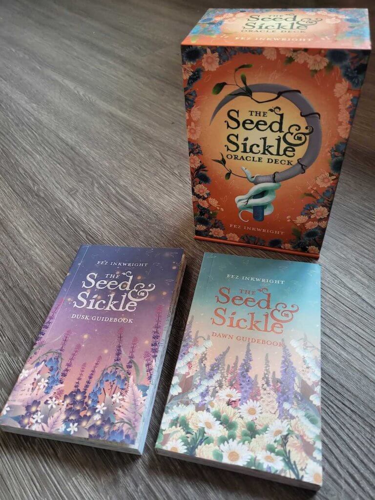 The box for the Seed and Sickle Oracle, along with its 2 guidebooks: Dawn and Dusk