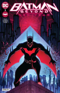 Batman Beyond standing on a roof with a triangle of blue light behind him