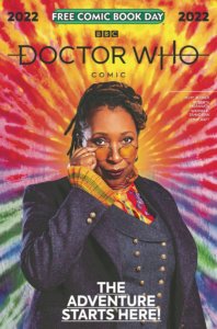 The Fugitive Doctor, a Black Woman, stands in front of a tie-dye background. She lowers her glasses, stares at the reader and smiles