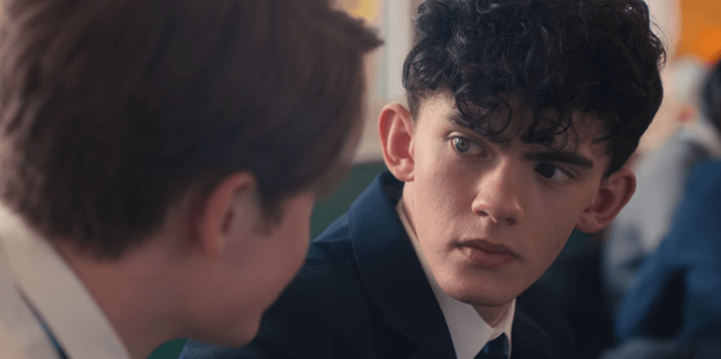 Nick and Charlie sit in class in Netflix's 'Heartstopper.'