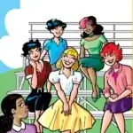 In a visual parody of the Summer Lovin' number from grease, Betty is dressed like modest 50s teenager sandy olsen as she regales all of her fellow lady riverdalians on a set of bleachers. The sky is blue with a single cloud in it and the grass is green