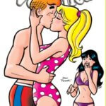 Redheaded thin white teenager archie andrews kisses thin white blond teenager betty cooper in front of a plain white backdrop. Betty olds Archie by the head and her long blond hair is held back by a pink hairtie. He's wearing a red-and-blue striped swimtrunk set, while betty wears a pink and white polka dot swimsuit. In the background, Thin white brunette teenager veronica lodge reacts with horror. She wears a violet bikini