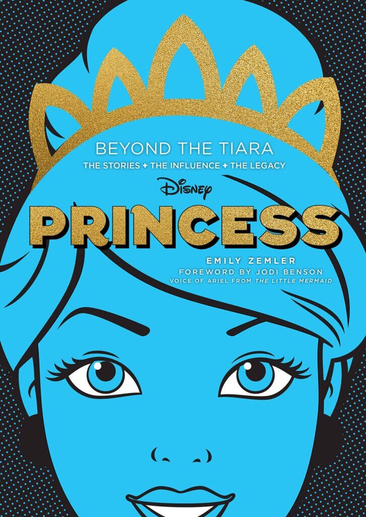 A princess' face is bright blue and foregrounded; her swept-up hair is held by a golden tiara