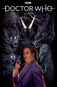 The Fugitive Doctor, a Black Woman, stands in front of several demons ready to pounce on her.