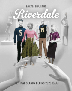 Mannequins wearing the iconic costumes of Betty, Veronica and Jughead are seen in a plain white room. In the foreground, two white mannequin hands can be seen reaching out for our gang