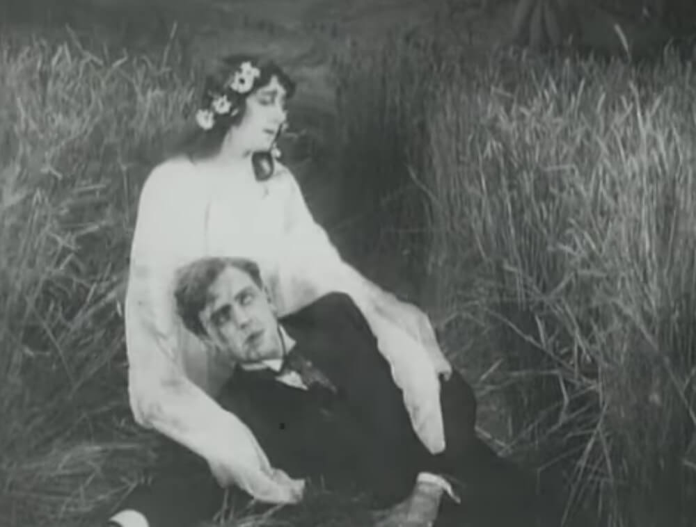 Still from the film After Death (1915). Dream sequence showing. Vera Karalli as a ghost, embracing the body of the film's hero (Vitold Polonsky)