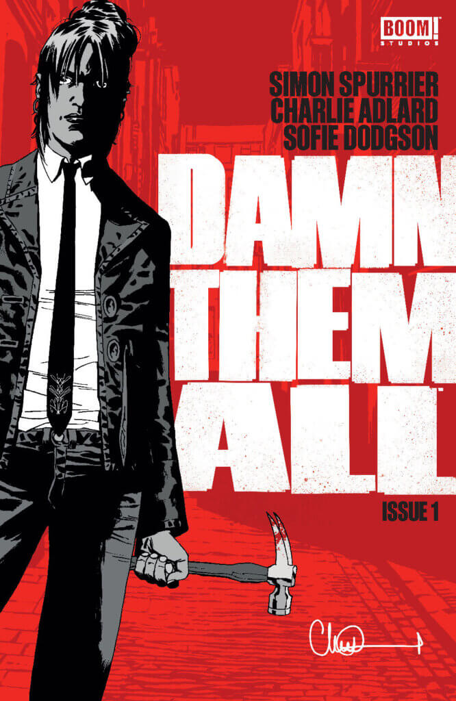 The cover to Damn Them All #1, featuring a young woman with dark hair in black and white. She waears a jacket, button-up shirt, and tie, and holds a hammer in one hand. Text on the cover reads, "Boom! Studios, Simon Spurrier, Charlie Adlard, Sofie Dodgson, Damn Them all, Issue 1."