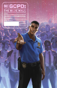 A Black police officer standing in front of a crowd, holding his hand towards the reader