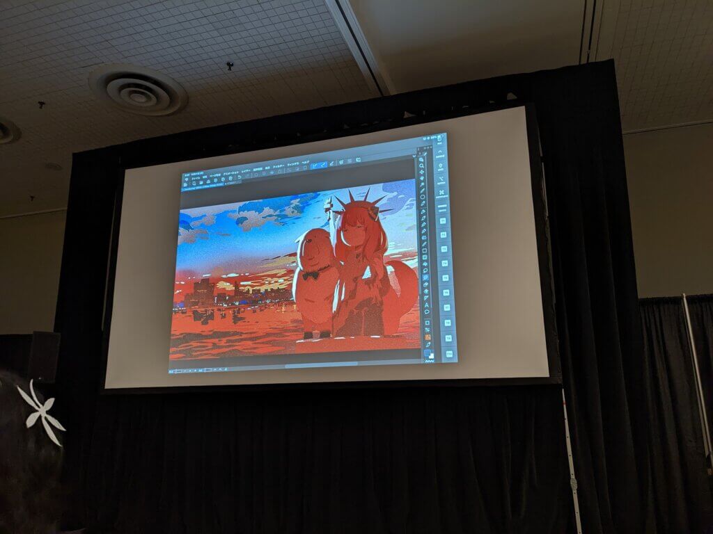 final art made by Syo5 in live drawing at WIT Studio 10th anniversary panel, showing Anya and Bond from Spy x Family as the Statue of Liberty in sunset.