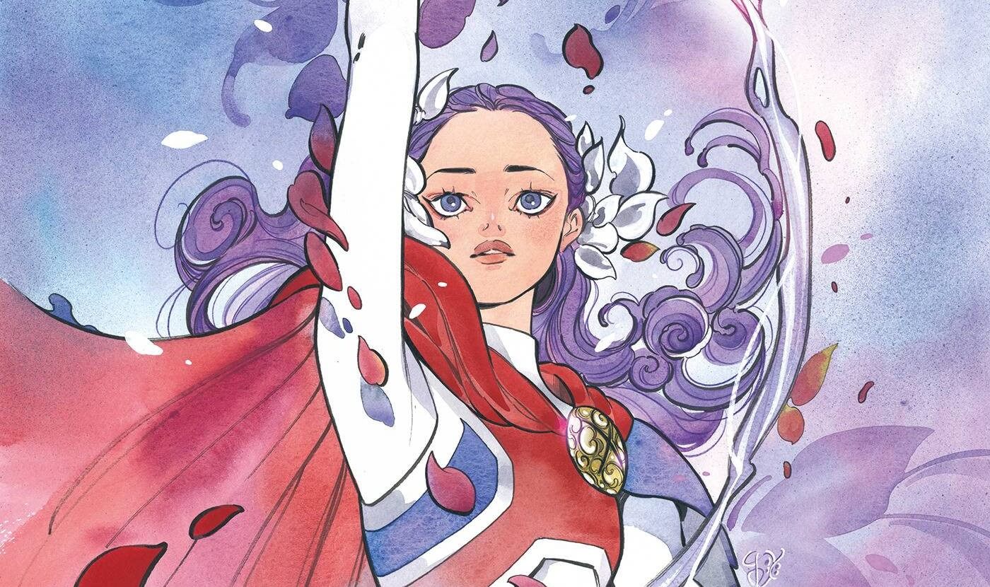Graphic of Captain Britain, a person with long purple hair wearing a costume that resembles the British flag with a long red cape
