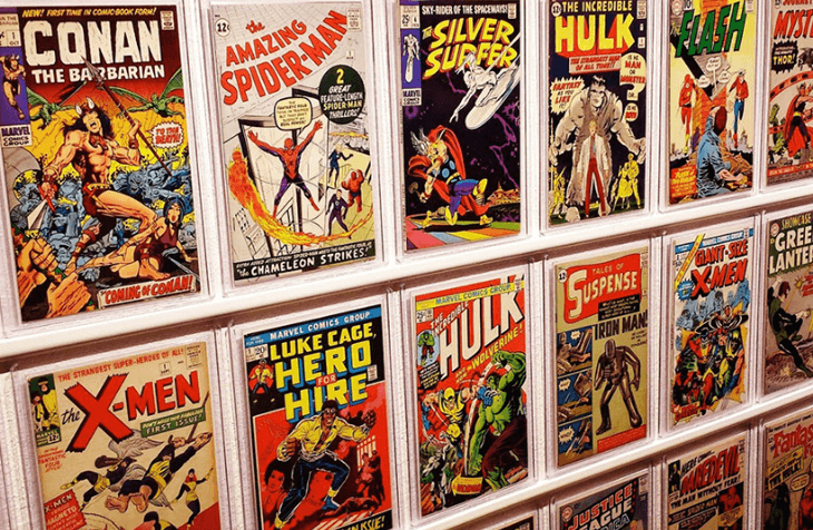 Comic books displayed on the outside of comic storage drawers.
