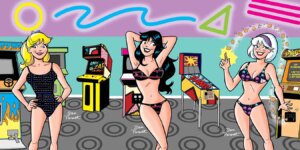 Betty, Veronica, and Sabrina in an arcade wearing arcade game themed swimsuits.