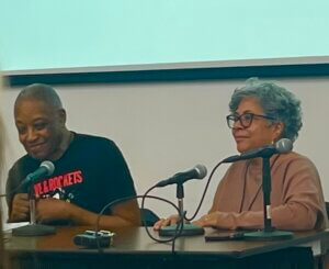 Emily Lauer's photo shows Calvin Reid interviewing Barbara Brandon Croft at MoCCA Fest 2023