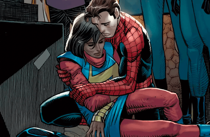 Panel from Amazing Spider-Man 26 depicting Peter Parker holding Kamala Khan in his arms