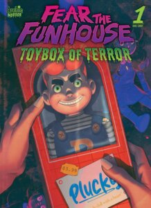 A pair of white hands hold a red boxed doll which contains a figure which resembles Archie Andrews. White and red-haired, it smiles malevolently at the viewer, wearing a blue-striped white turtleneck and a pair of blue overalls with a red letter on them, half-visible to the viewer. Behind the doll, bats fly through a dark blue night sky.