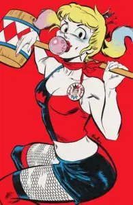 Betty Cooper dressed as Harley Quinn in front of a plain red backdrop