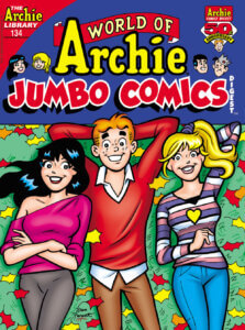 Veronica, Betty and Archie lie on grass dotted by autumn leaves.