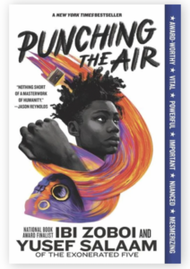 The cover of Punching the Air by Ibi Zoboi and Yusef Salaam of the Exonerated Five shows the face and fist of a young Black person surrounded by swirling color