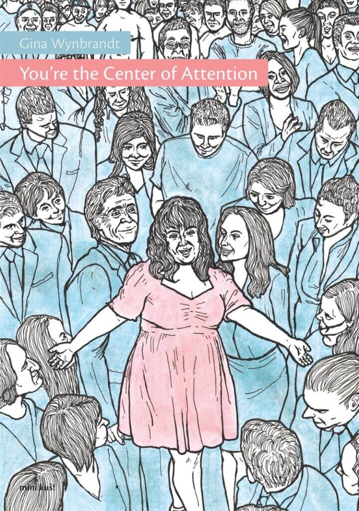 Cover of Gina Wynbrandt's You're the Center of Attention. Gina is in the center, smiling with her arms spread, wearing a pink dress. She's surrounded by smiling people whose clothes are all blue. 