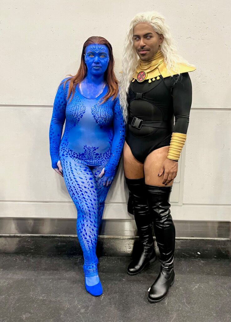 Two cosplayers at NYCC 2023 are Mystique and Storm. 