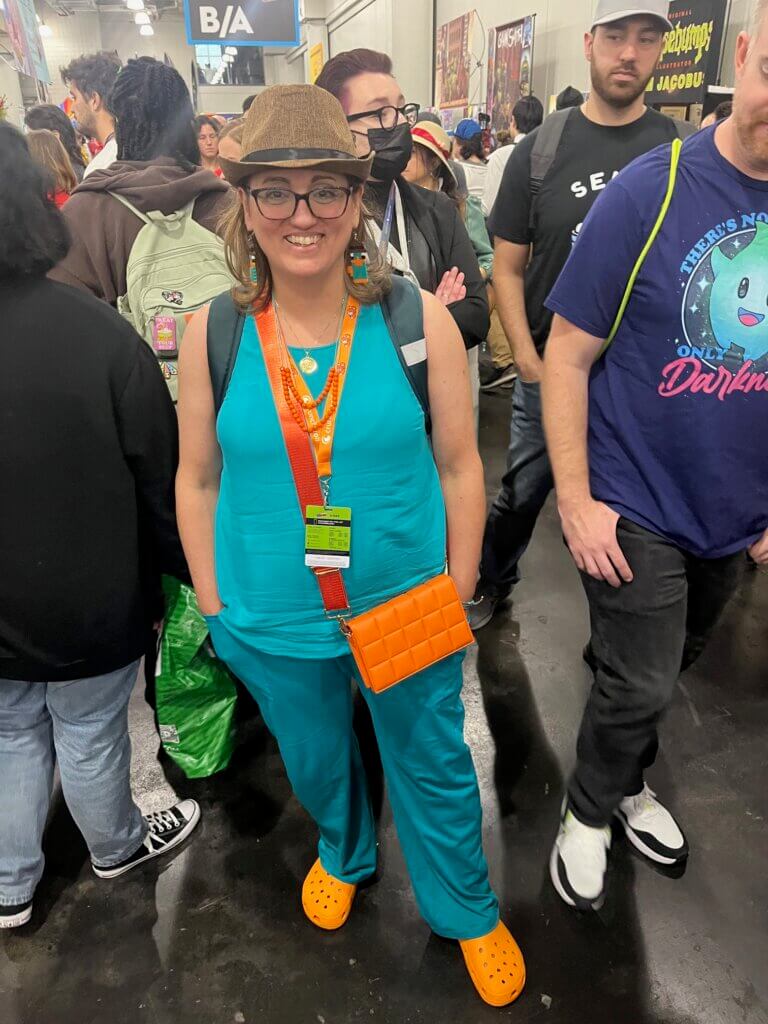 A cosplayer at NYCC 2023 is dressed as Perry the Platypus. 