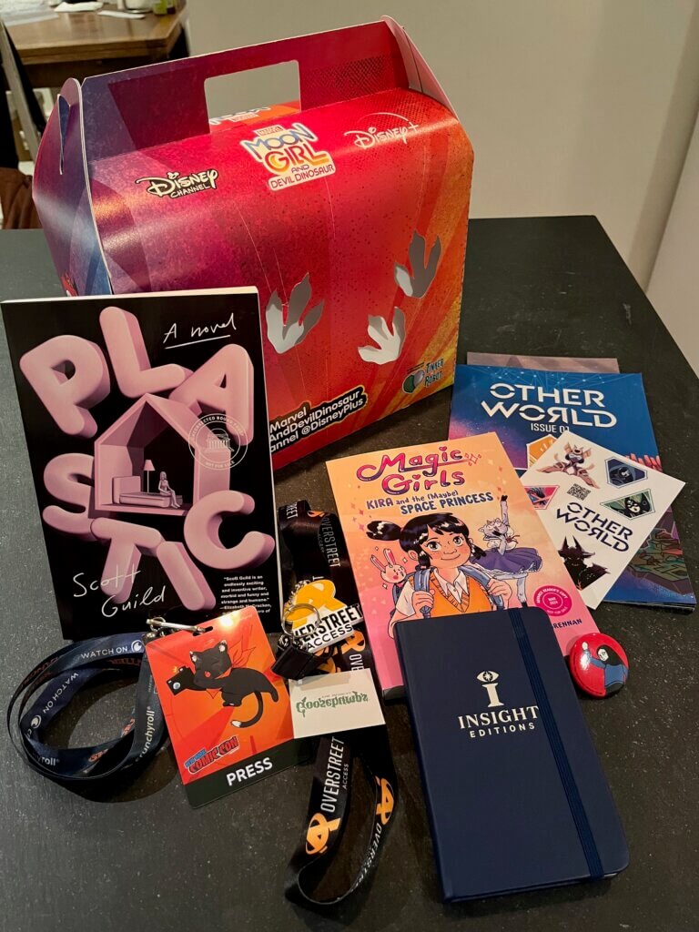 What I brought home from NYCC 2023, free stuff edition.