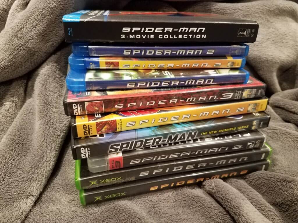 A stack of Spider-Man related DVDs and Blu-Rays