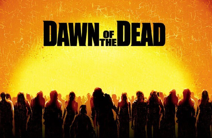 Poster for the 2003 film Dawn of the Dead. Shows illustrated silhouettes of a zombie horde against a sunrise backdrop.