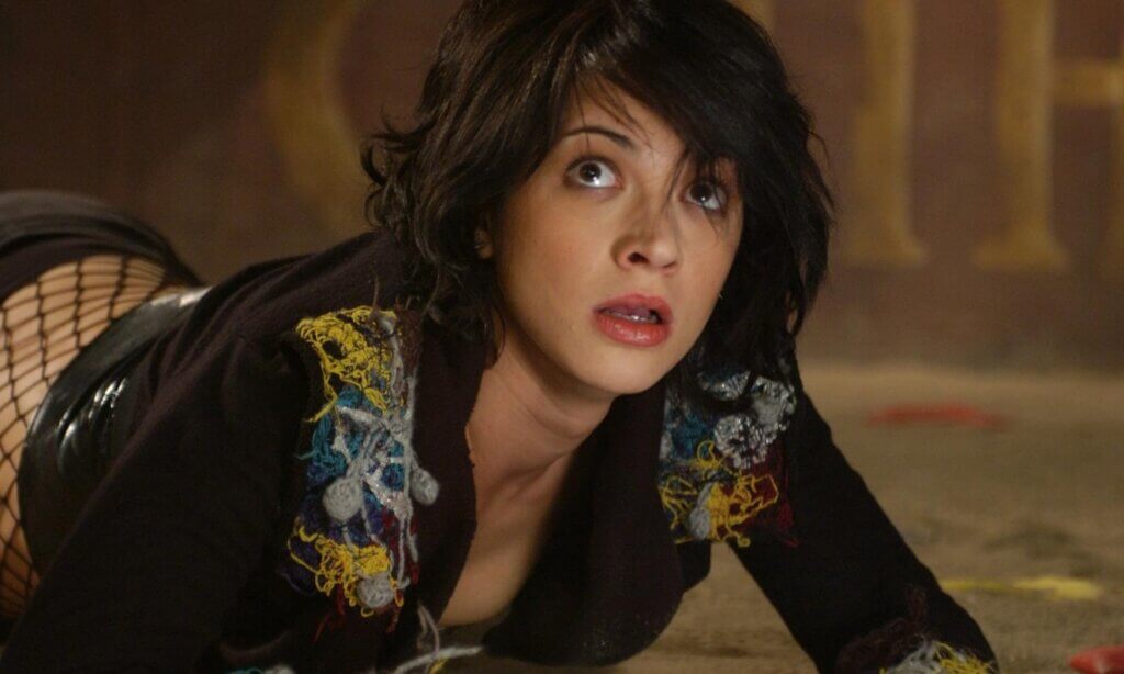 Still from the film Land of the Dead. Asia Argento looks up in fear.